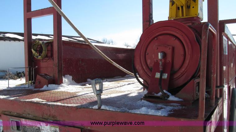 image for item G2216 1997 GMC C7500 digger derrick truck