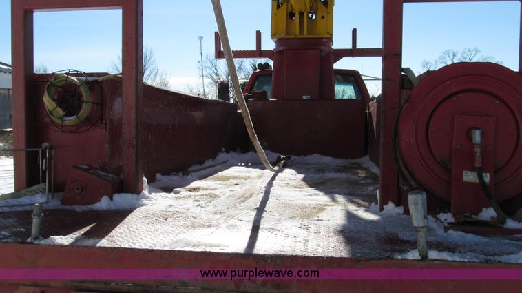 image for item G2216 1997 GMC C7500 digger derrick truck