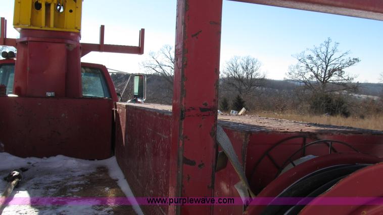 image for item G2216 1997 GMC C7500 digger derrick truck