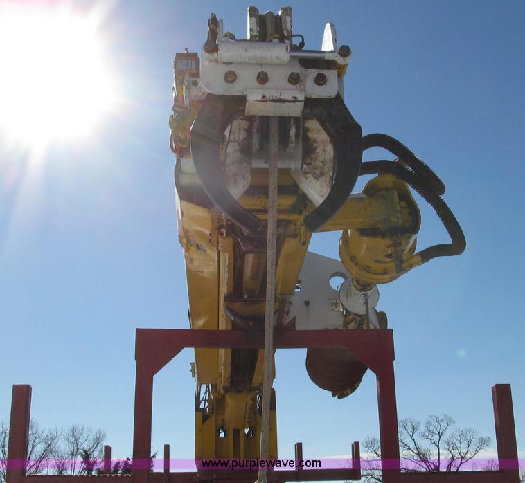 image for item G2216 1997 GMC C7500 digger derrick truck