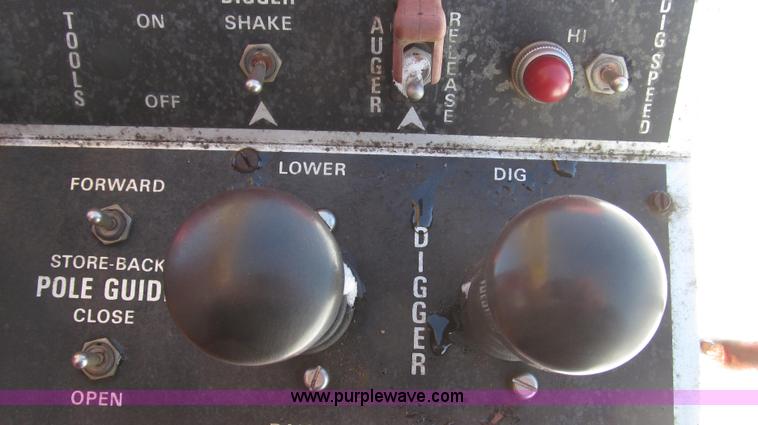 image for item G2216 1997 GMC C7500 digger derrick truck