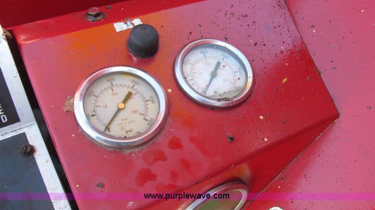 image for item G2216 1997 GMC C7500 digger derrick truck