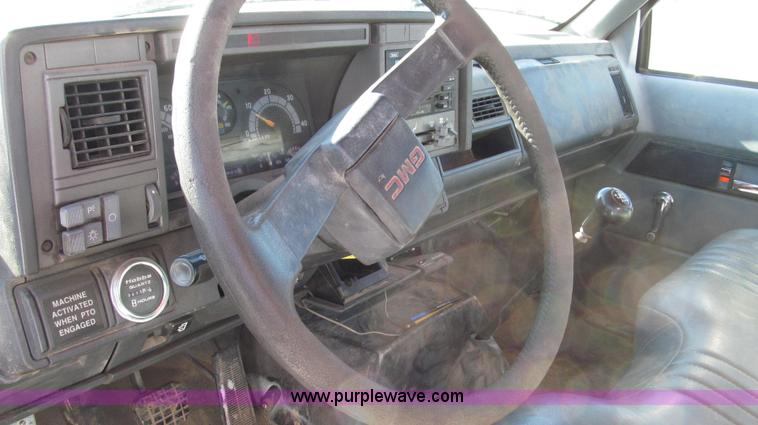 image for item G2216 1997 GMC C7500 digger derrick truck