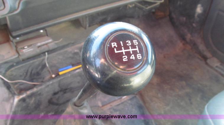 image for item G2216 1997 GMC C7500 digger derrick truck