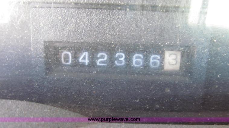 image for item G2216 1997 GMC C7500 digger derrick truck