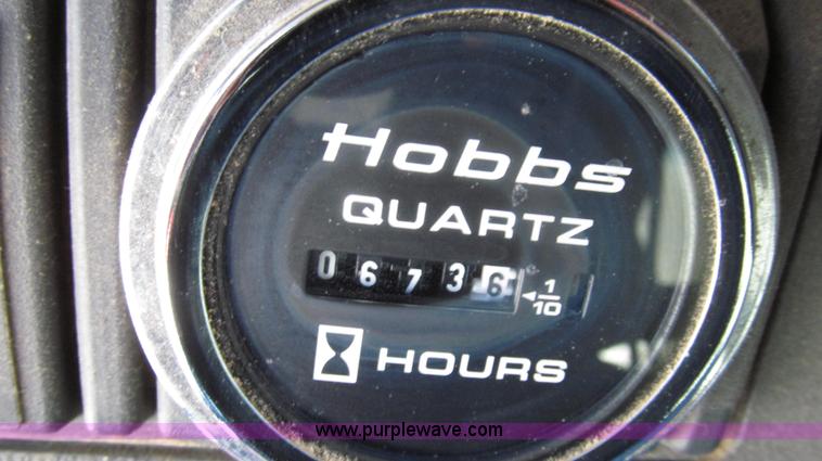 image for item G2216 1997 GMC C7500 digger derrick truck