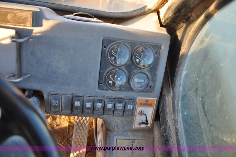 image for item G6347 1999 Caterpillar TH82 telehandler