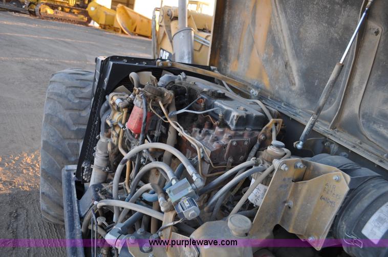 image for item G6347 1999 Caterpillar TH82 telehandler