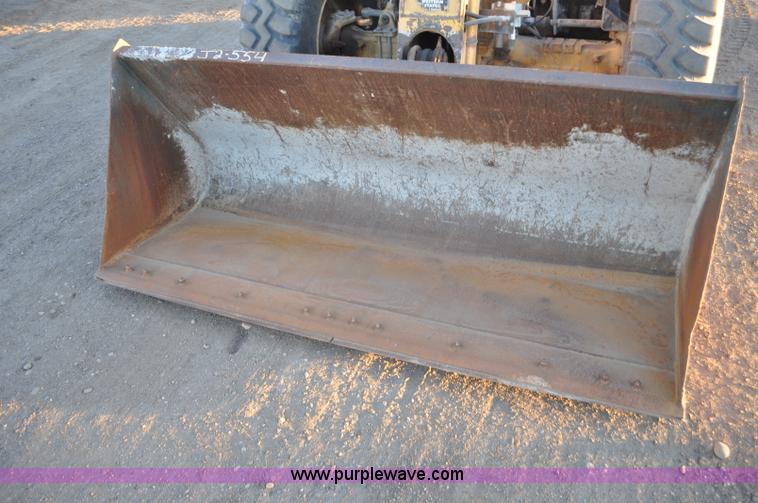 image for item G6347 1999 Caterpillar TH82 telehandler