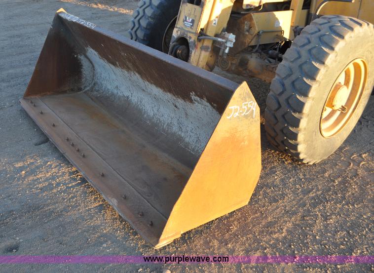 image for item G6347 1999 Caterpillar TH82 telehandler