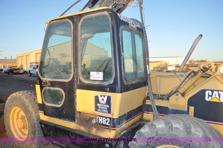 image for item G6347 1999 Caterpillar TH82 telehandler