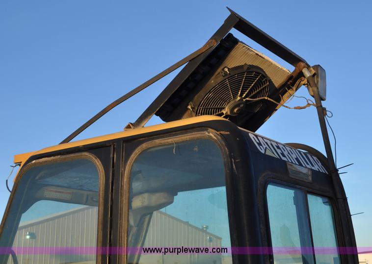 image for item G6347 1999 Caterpillar TH82 telehandler