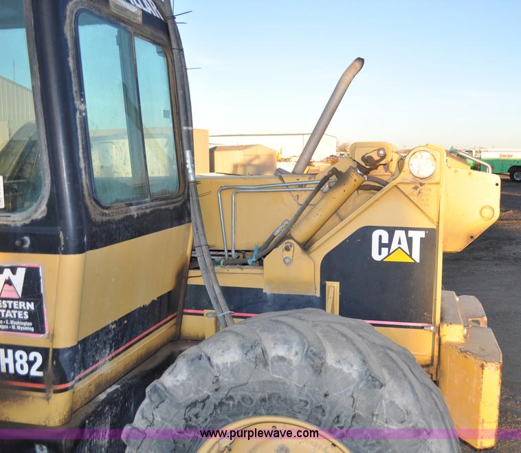image for item G6347 1999 Caterpillar TH82 telehandler