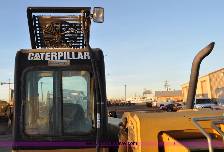 image for item G6347 1999 Caterpillar TH82 telehandler