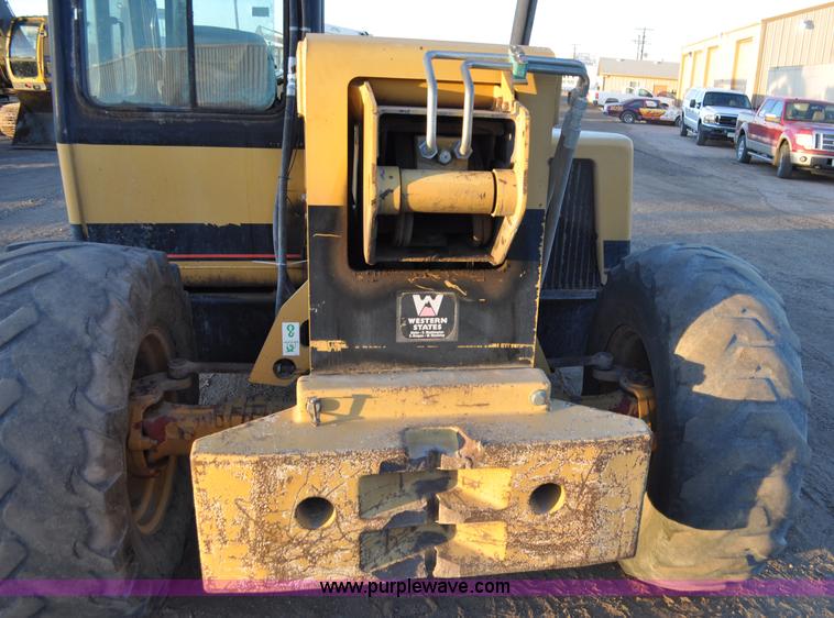 image for item G6347 1999 Caterpillar TH82 telehandler