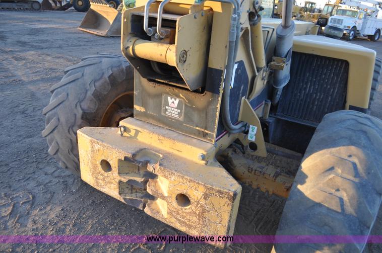 image for item G6347 1999 Caterpillar TH82 telehandler
