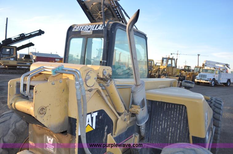 image for item G6347 1999 Caterpillar TH82 telehandler