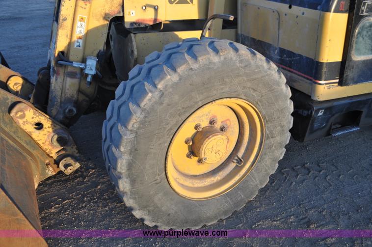 image for item G6347 1999 Caterpillar TH82 telehandler