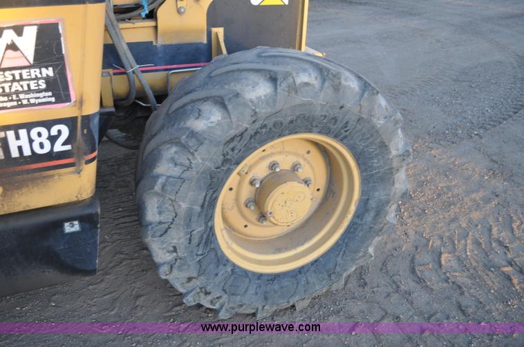 image for item G6347 1999 Caterpillar TH82 telehandler