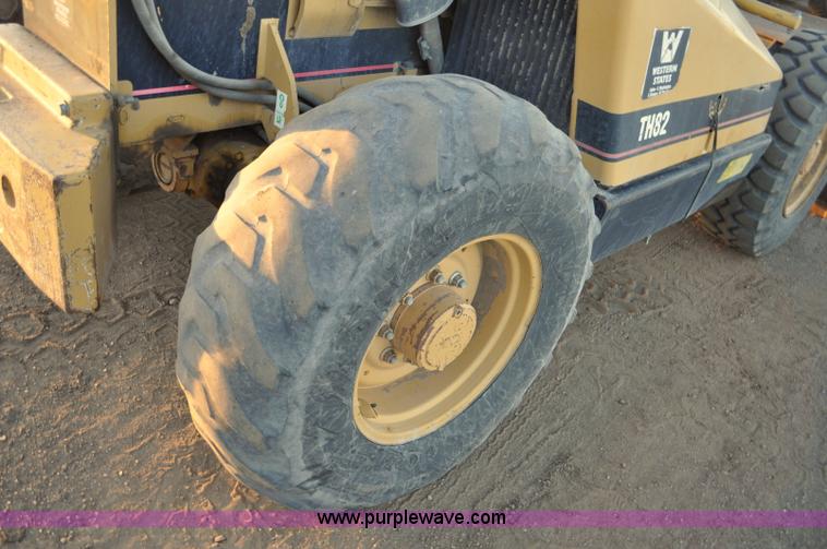 image for item G6347 1999 Caterpillar TH82 telehandler