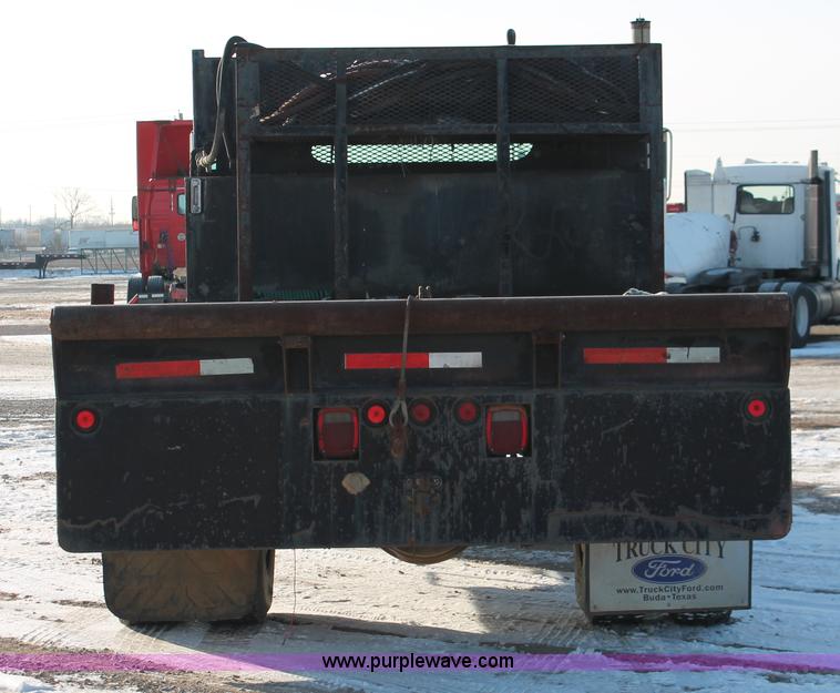 image for item H8368 2001 International 4700 Crew Cab flatbed truck