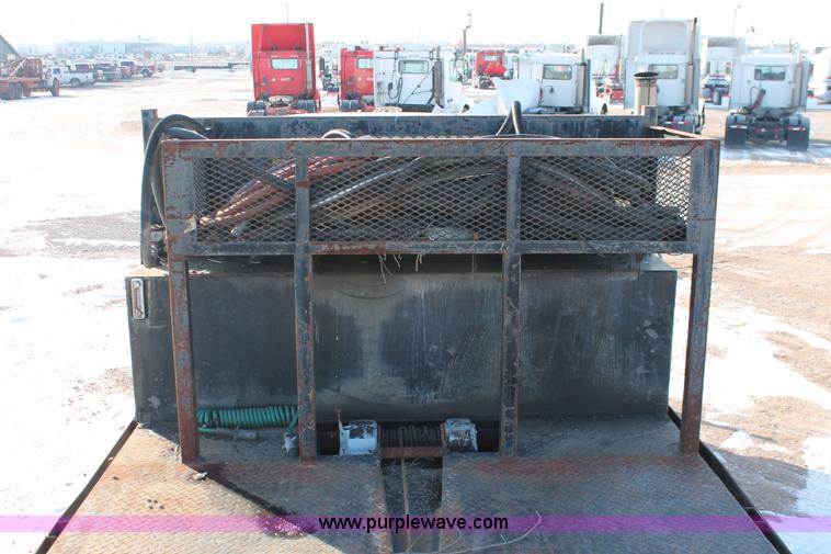 image for item H8368 2001 International 4700 Crew Cab flatbed truck