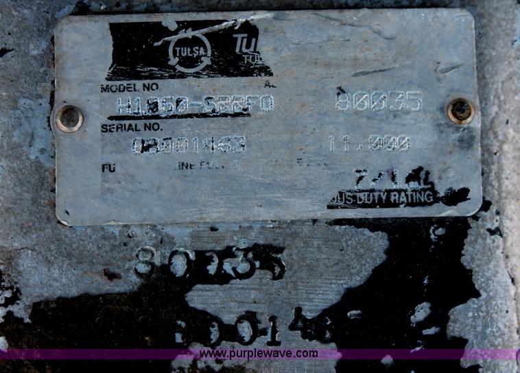 image for item H8368 2001 International 4700 Crew Cab flatbed truck