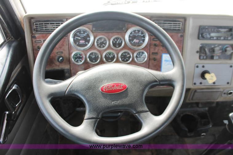 image for item H8371 2006 Peterbilt 335 flatbed truck