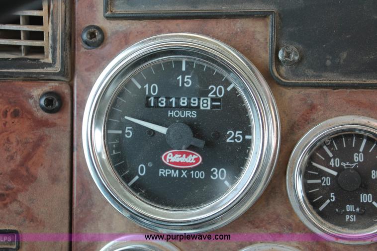 image for item H8371 2006 Peterbilt 335 flatbed truck