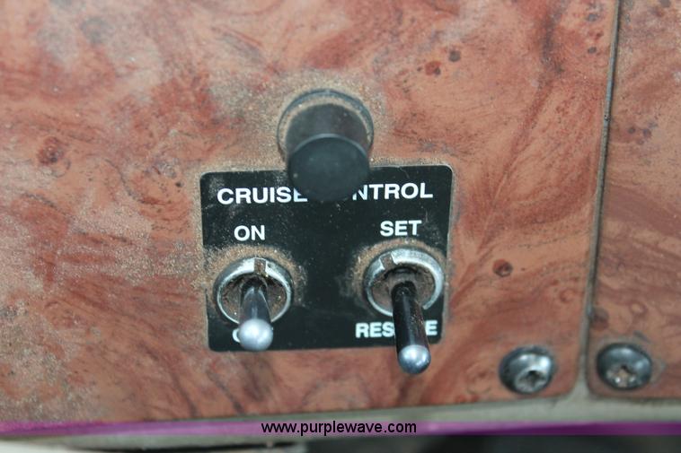 image for item H8371 2006 Peterbilt 335 flatbed truck