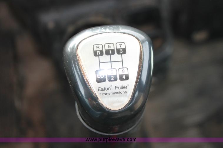 image for item H8371 2006 Peterbilt 335 flatbed truck