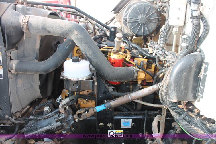 image for item H8371 2006 Peterbilt 335 flatbed truck