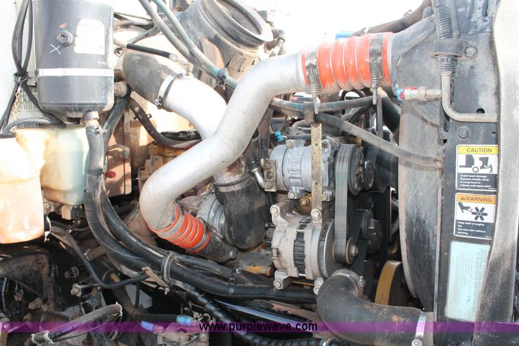 image for item H8371 2006 Peterbilt 335 flatbed truck