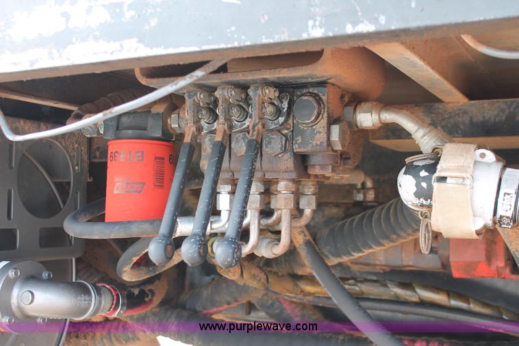 image for item H8371 2006 Peterbilt 335 flatbed truck