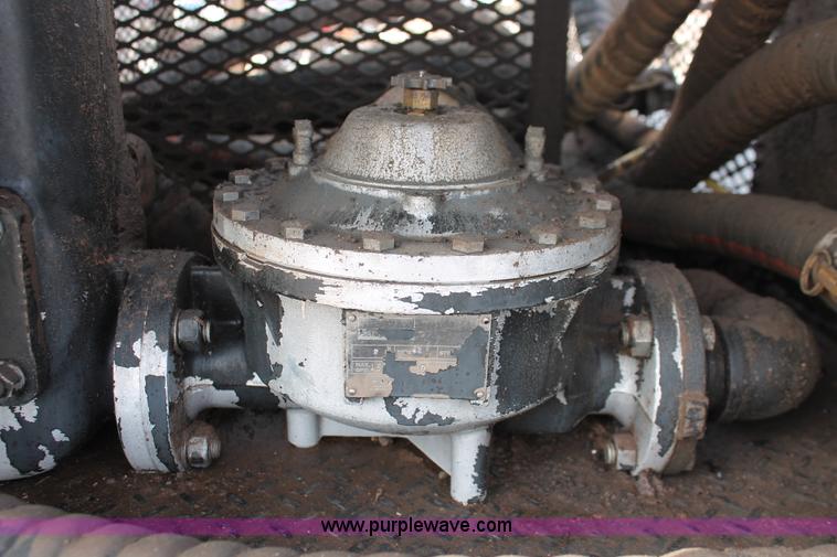 image for item H8371 2006 Peterbilt 335 flatbed truck