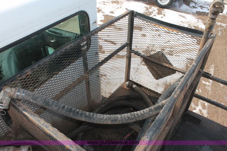 image for item H8371 2006 Peterbilt 335 flatbed truck