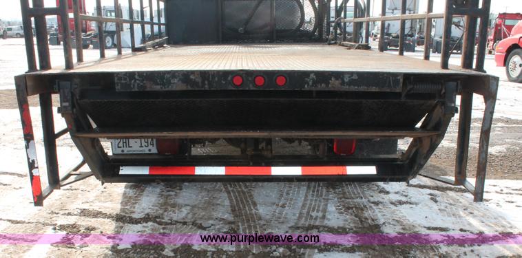 image for item H8371 2006 Peterbilt 335 flatbed truck