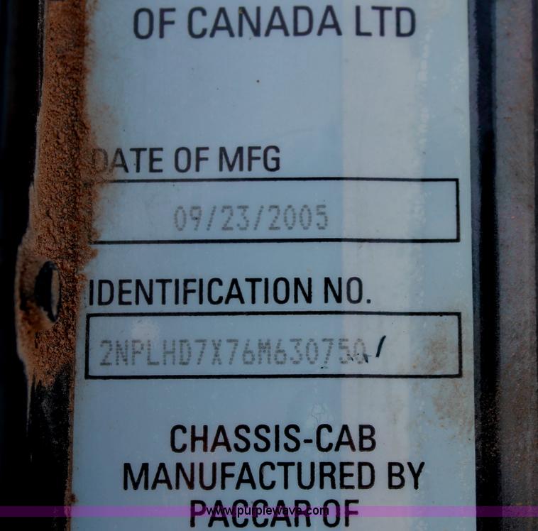 image for item H8371 2006 Peterbilt 335 flatbed truck