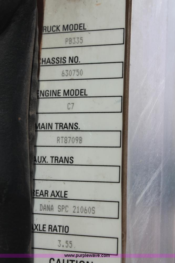 image for item H8371 2006 Peterbilt 335 flatbed truck