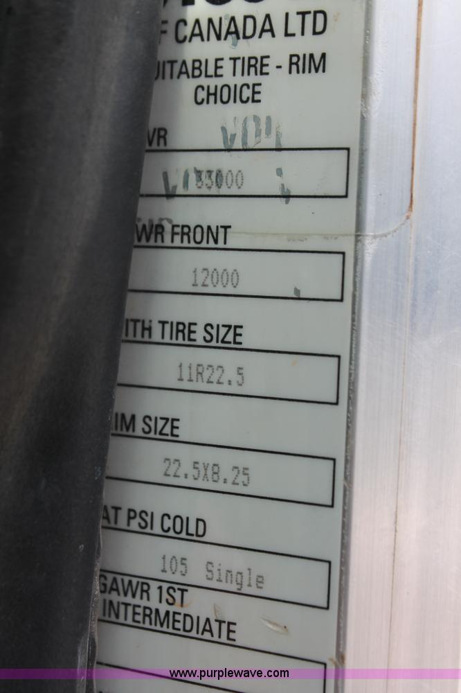 image for item H8371 2006 Peterbilt 335 flatbed truck