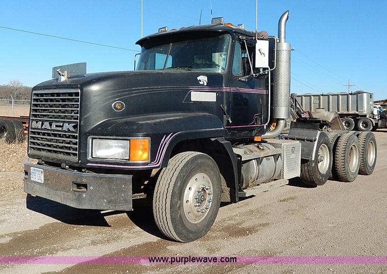 image for item I9484 1997 Mack CL713 triple axle semi truck