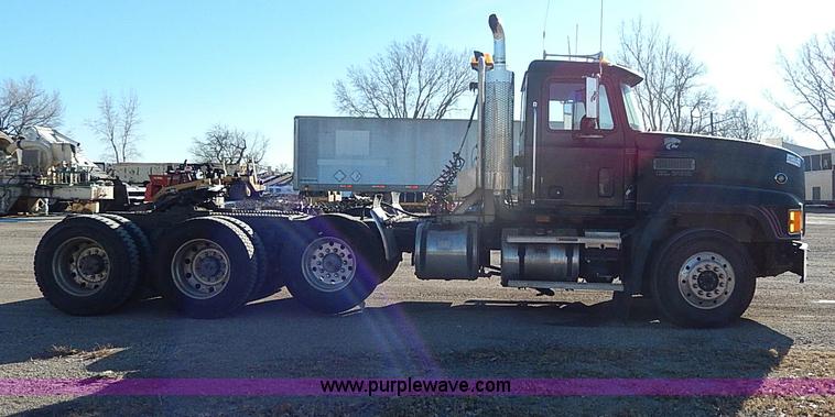image for item I9484 1997 Mack CL713 triple axle semi truck