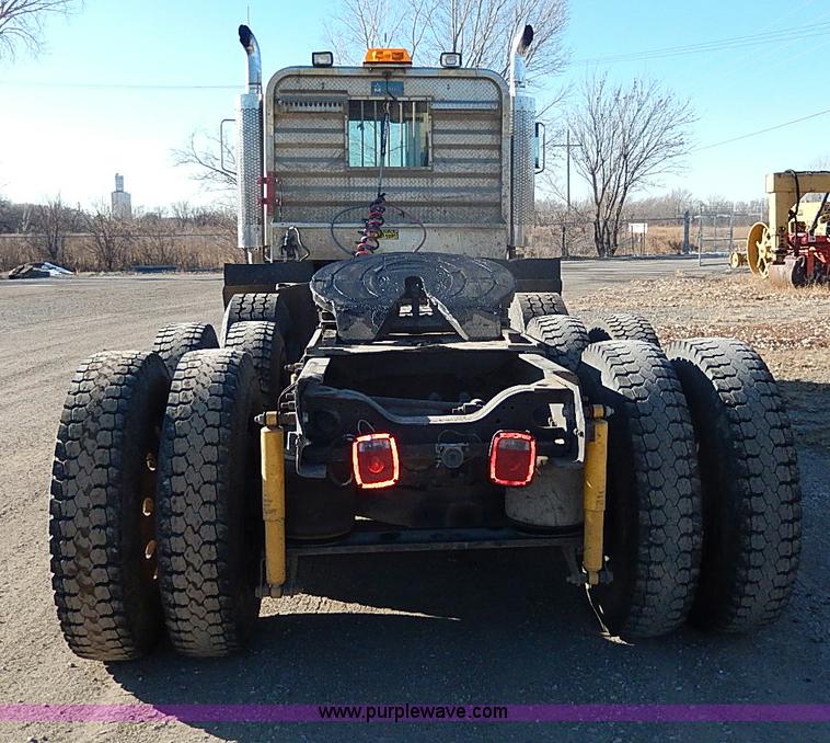 image for item I9484 1997 Mack CL713 triple axle semi truck