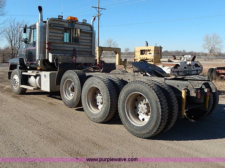 image for item I9484 1997 Mack CL713 triple axle semi truck