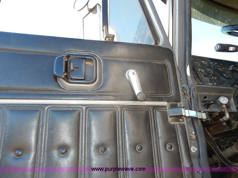 image for item I9484 1997 Mack CL713 triple axle semi truck