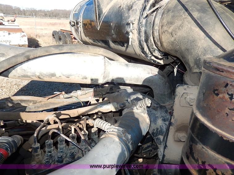 image for item I9484 1997 Mack CL713 triple axle semi truck