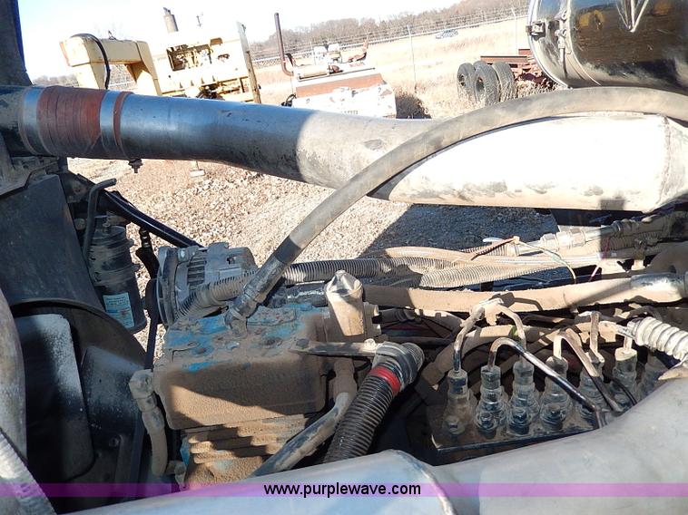 image for item I9484 1997 Mack CL713 triple axle semi truck