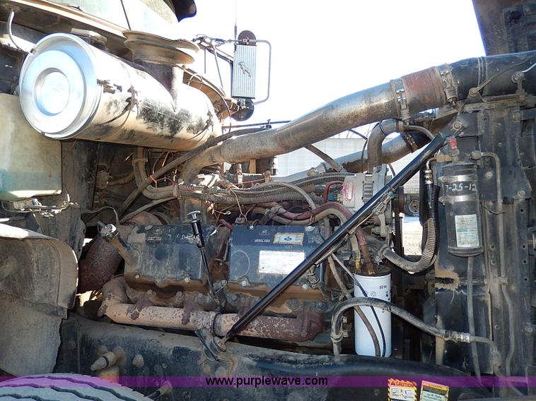 image for item I9484 1997 Mack CL713 triple axle semi truck