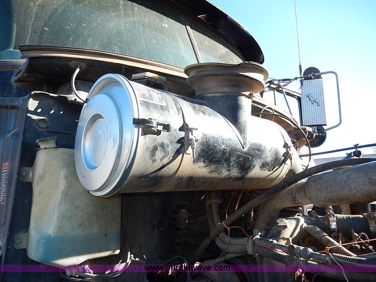 image for item I9484 1997 Mack CL713 triple axle semi truck