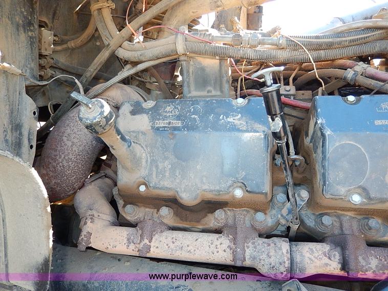 image for item I9484 1997 Mack CL713 triple axle semi truck